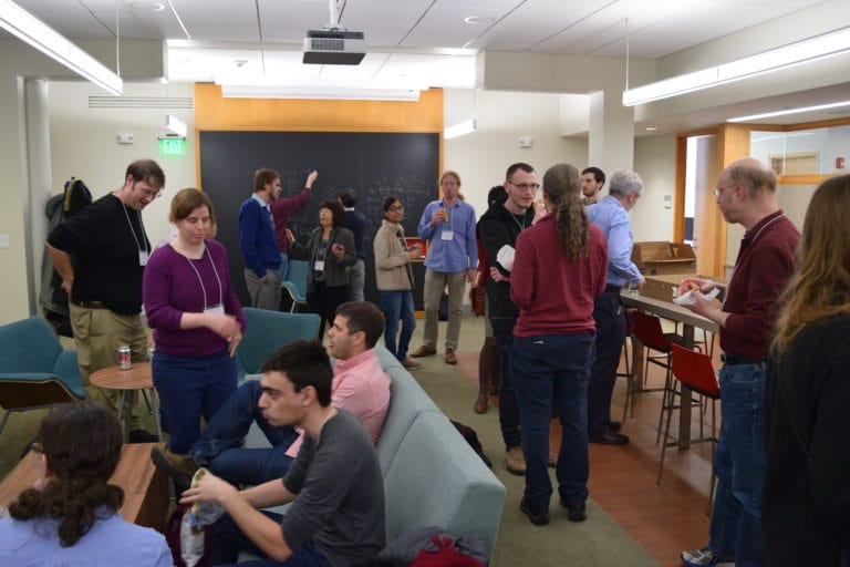 people having a discussion at the Workshop on Probabilistic and Extremal Combinatorics