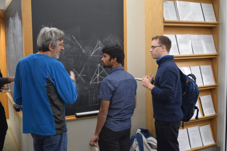 Scenes from The Workshop on Algebraic Methods in Combinatorics