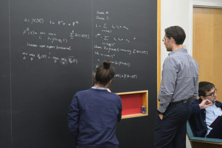 Scenes from The Workshop on Algebraic Methods in Combinatorics