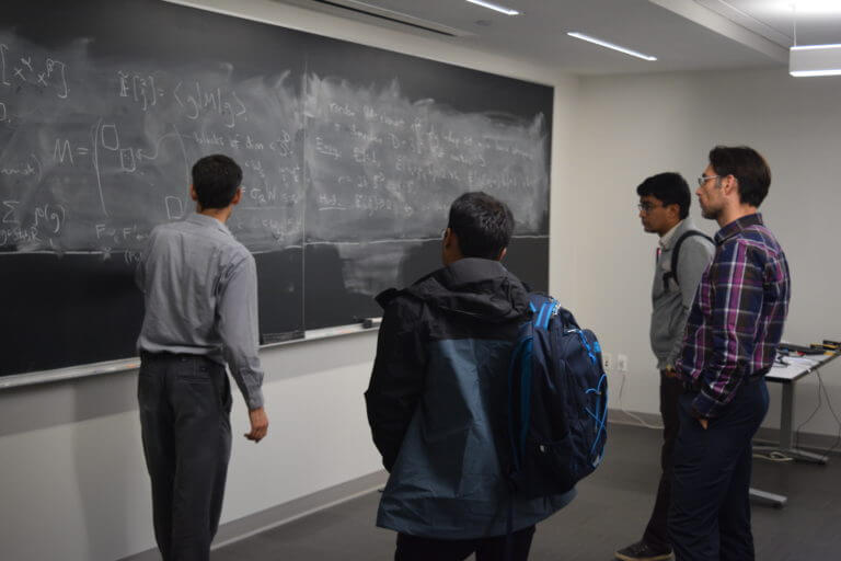 Scenes from The Workshop on Algebraic Methods in Combinatorics