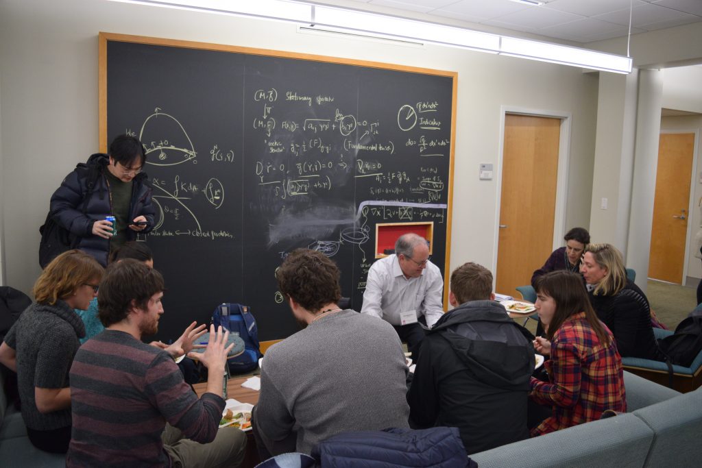 Participants discussing on group during refreshment:Workshop on Morphogenesis:Geometry and Physics
