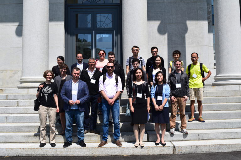 Group Photo of participants standing at the stairs